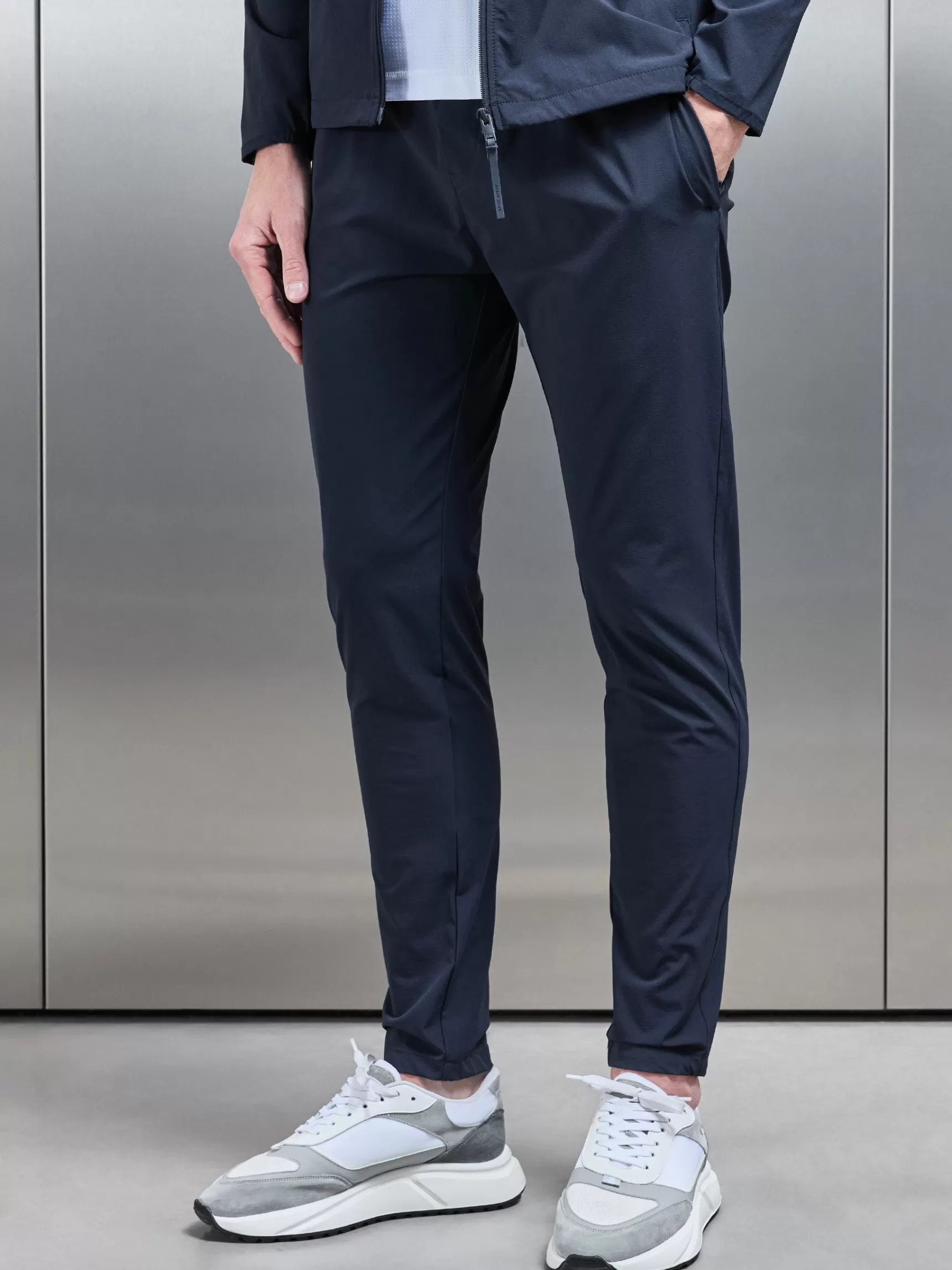 Hot ARNE Active Technical Tapered Trackpant - Navy
