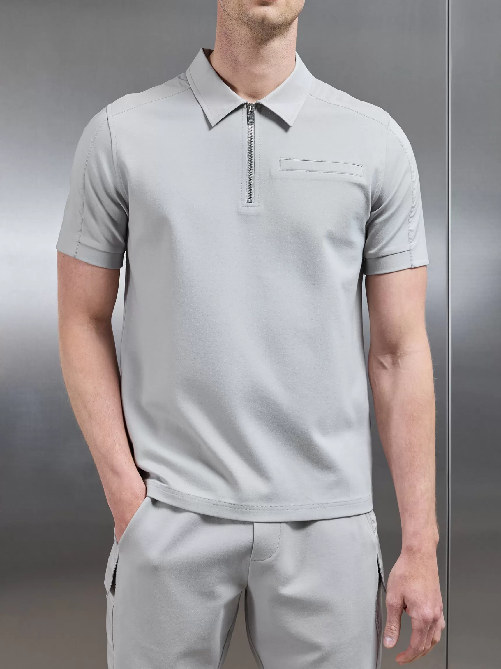 Shop ARNE Hybrid Cargo Zip Polo Shirt - Stone